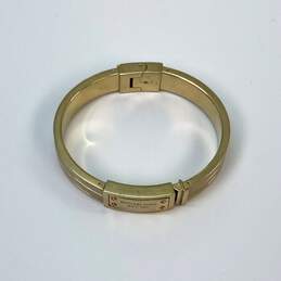 Designer Michael Kors Gold Tone Heritage Logo Hinged Bangle Bracelet alternative image