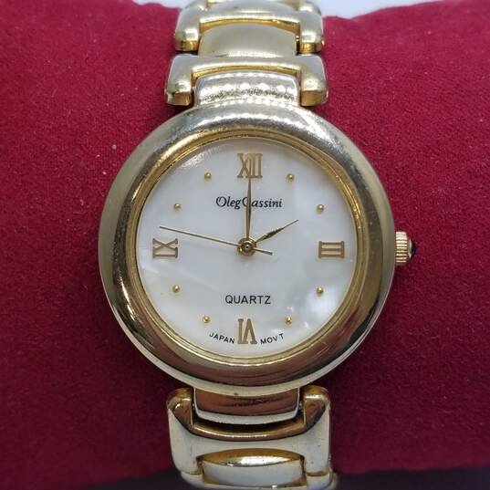Oleg Cassini 29 Case Gold Tone Unique Bracelet Quartz Watch image number 1