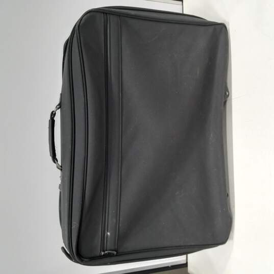 Rolling Black Travel Suitcase image number 3