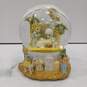 Enesco Precious Moments Away in a Manger Musical Snowglobe image number 1