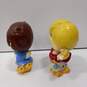 Pair Of Vintage Multicolor Enesco Sports Skwirts Coin Banks image number 4