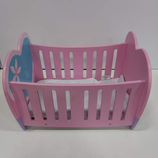 Tolly Tots International Wooden Pink/Blue/Purple Baby Doll Crib (10.50"/15.25"/14.75") image number 2