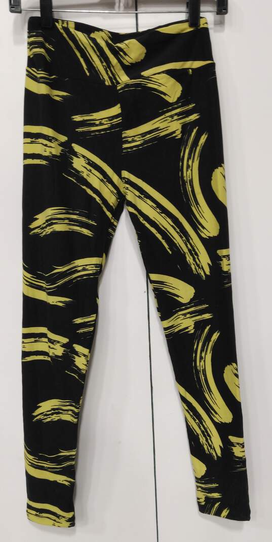 Buy the Lularoe Leggings Black/Yellow Paint Brush Stroke Pattern One Size