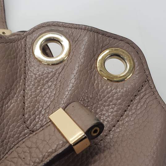 Michael Kors Brown Pebble Leather Drawstring Hobo Handbag image number 7