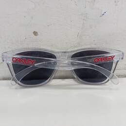Clear Oakley Sunglasses Frames w/ Transparent Red Lenses alternative image