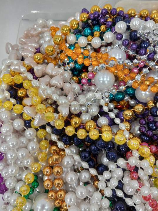 19.3 Pound Bundle of Assorted Mardi Gras Costume Jewelry image number 3