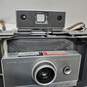 Polaroid Land Camera Automatic 100 with Case and Accessories Flash Bulbs Etc image number 3
