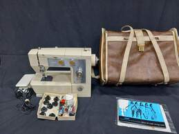 Montgomery Ward Sewing Machine Model No. UHT J1460 in Leather Case