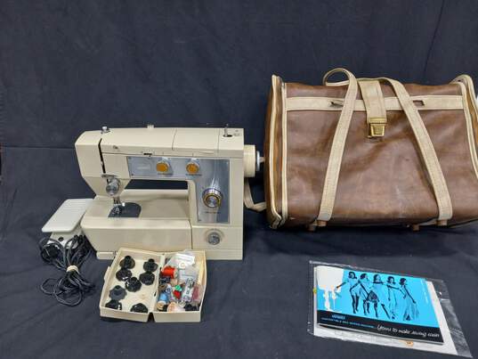 Montgomery Ward Sewing Machine Model No. UHT J1460 in Leather Case image number 1