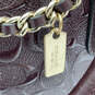 Womens Maroon Shiny Leather Signature Embossed Detachable Strap Satchel Bag image number 5