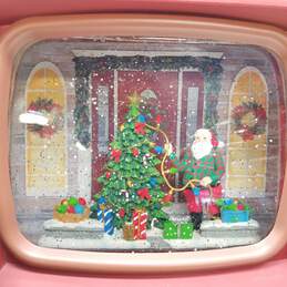 Raz Imports Santa Decorating Tree Light Up TV Snow Globe alternative image