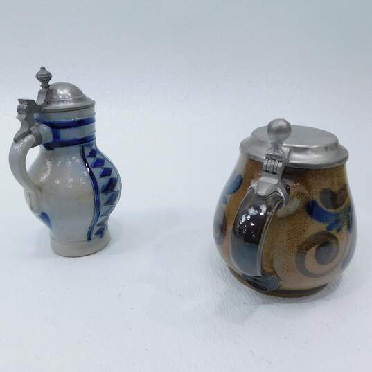 Set of 2 Small Handarbeit Clay Steins Signed image number 1