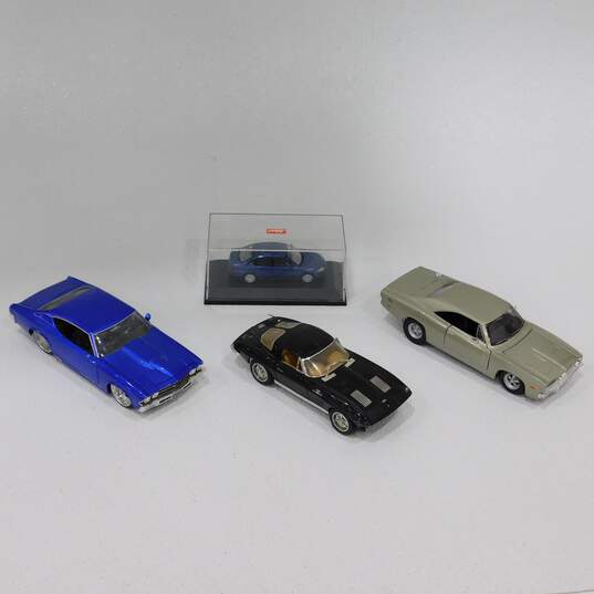 Assorted Diecast Cars Maisto Chevy Corvette Stingray VW Passat Limousine image number 1