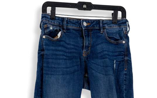 Womens Blue Medium Wash Distressed Raw Hem Denim Pockets Skinny Jeans Sz 6 image number 3