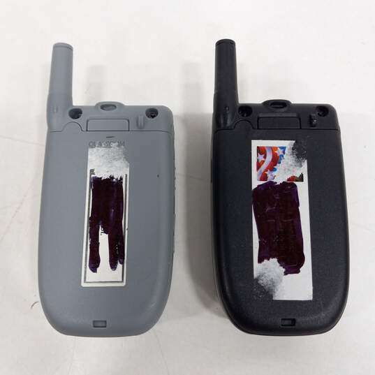 Pair of Vintage Qwest Flip Phones image number 3