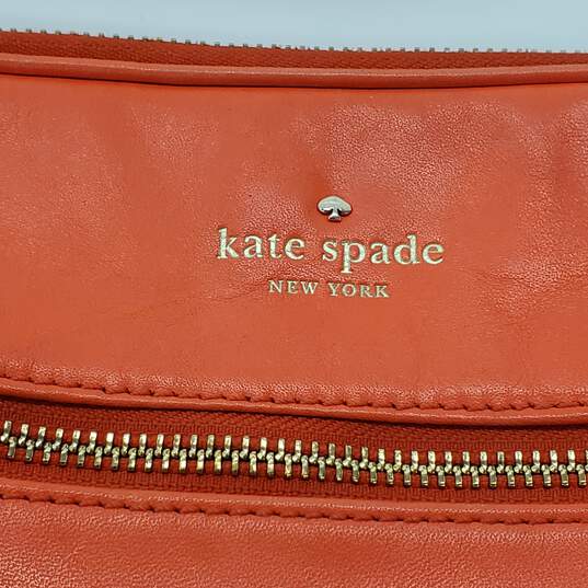 Kate Spade Coral Orange Leather Padded Tablet Crossbody Bag image number 2