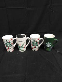 4 Starbucks Holiday Themed Tall Ceramic Coffee Cups 6"