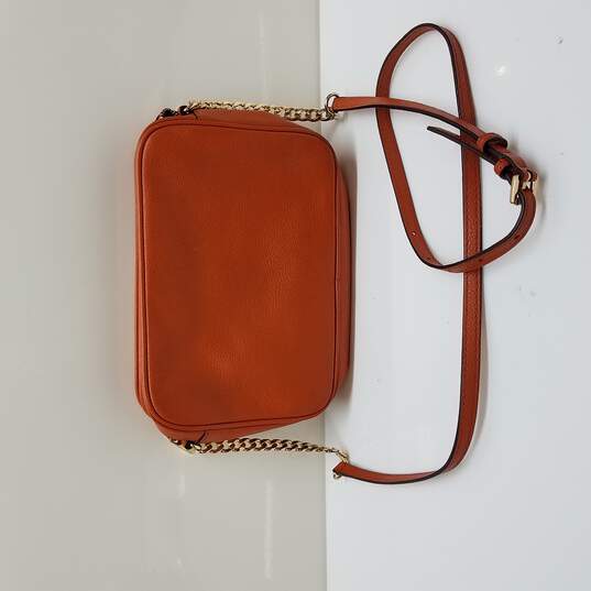 Buy the Michael Kors Orange Crossbody Bag | GoodwillFinds