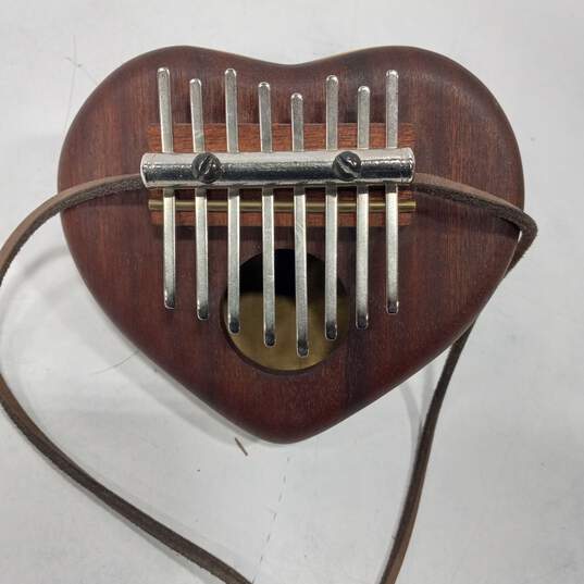 Mini Kalimba Heart Shaped Thumb Piano W/ Leather Strap image number 5