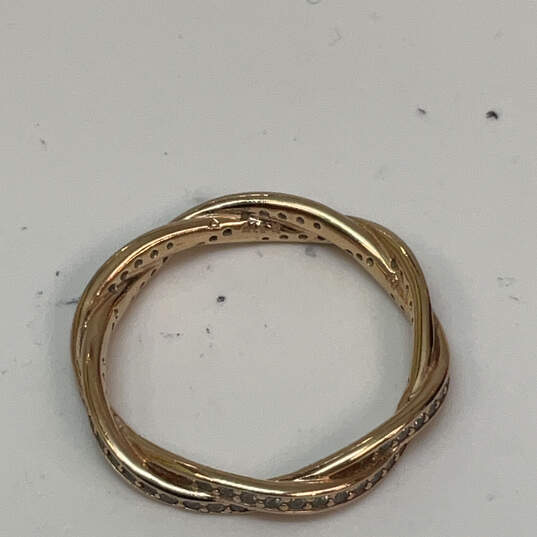 Designer Pandora Gold-Tone Cubic Zirconia Sparkling Twisted Lines Band Ring image number 2