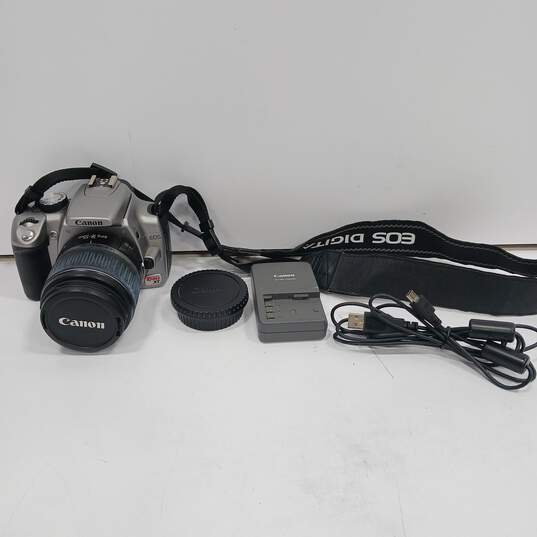 Black Canon Camera w/ Straps, Cord & Charger Model #1920705955 image number 1