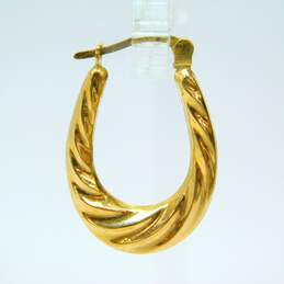 14K Yellow Gold Swirl Oblong Hoop Earrings 1.6g alternative image