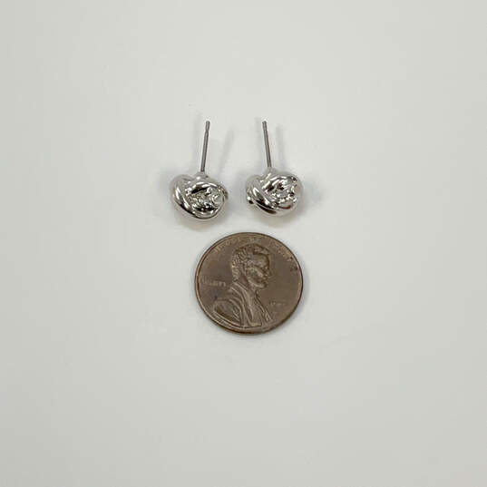 Designer Kate Spade Silver-Tone Twisted Fashionable Stud Earrings image number 3