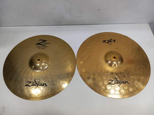 Bundle of 4 Zildjian Ride Cymbals And 5 Drumsticks In Case image number 2