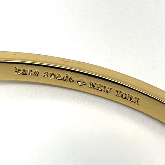 Designer Kate Spade Gold-Tone Love Notes Rhinestone Hinged Bangle Bracelet image number 4