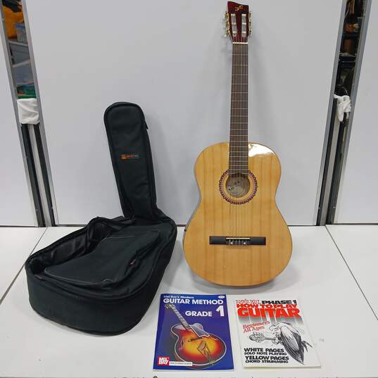 BROWN FIRST ACT MG320 ACOUSTIC GUITAR IN SOFT CASE W/ GUITAR BOOKS image number 1