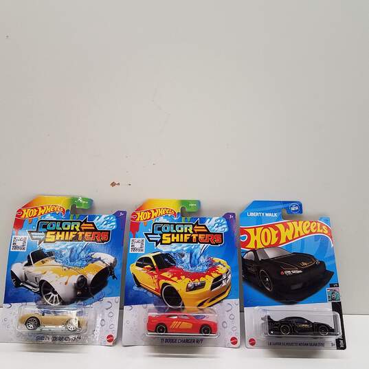 Bundle of 8 Assorted Hot Wheel Toy Car Packs image number 5