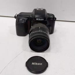 Nikon N50 35-80mm Film Camera w/ Lens & Soft Green Travel Case alternative image