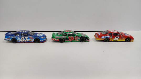 Bundle of 3 Assorted Action NASCAR Toy Cars image number 2