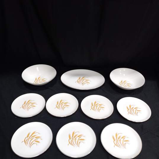 Bundle of 7 Homer Laughlin Golden Wheat White & Gold Tone Trim Ceramic Plates w/2 Matching Bowls and Serving Platter image number 1