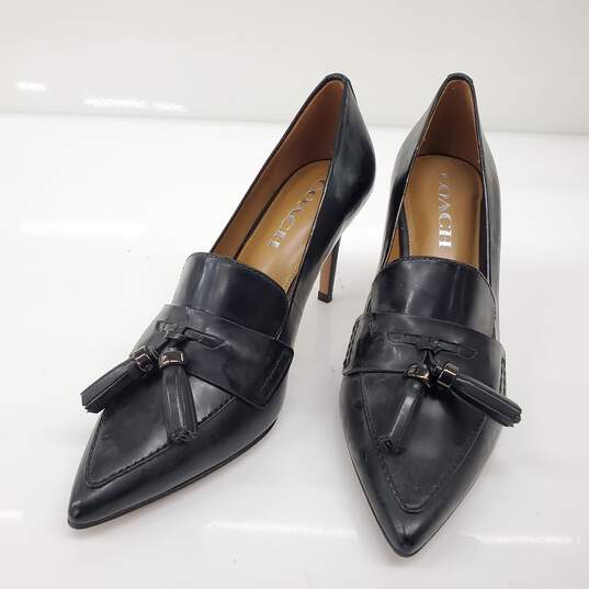 Coach Women's 'Spencer' Black Leather Tassel Heels Size 7 AUTHENTICATED image number 1
