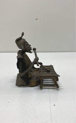 Hand Crafted Metal Figurine Seated Xylophone Player Sculpture alternative image