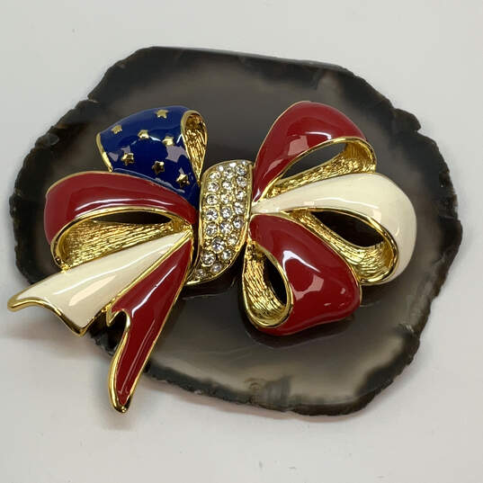 Designer Joan Rivers Gold-Tone Crystal Stone Enamel Flag Ribbon Brooch Pin image number 1
