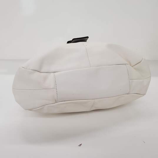 Moderate wear with some scuffs and scratches.  Coach Soho Lynn Soft White Leather Gray Trim Hobo Shoulder Bag image number 5