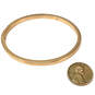 Designer Michael Kors Gold-Tone Round Shape Classic Bangle Bracelet image number 4