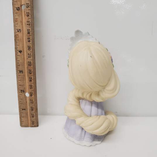Disney's 2012 Precious Moments Let your Power Shine Hand Painted Porcelain Statue image number 2