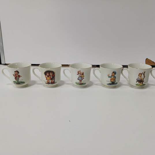 Set Of 23 MJ Hummel Merry Wanderer Multicolor Tea Cups And Saucers image number 2
