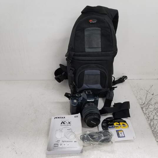 UNTESTED PENTAX K-x DAL 18-55mm AL Digital SLR Camera & Lowepro sling Bag image number 1