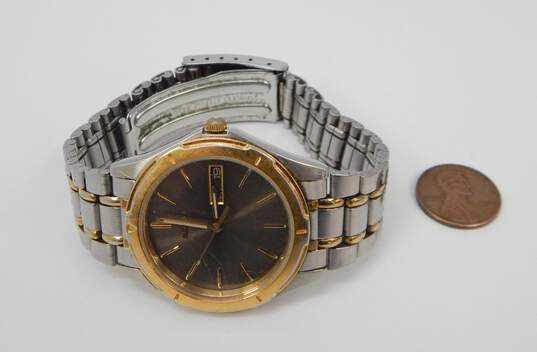 Buy the Seiko 7N43 6A09 Quartz Two Tone Day Date Mens Watch | GoodwillFinds