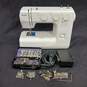Kenmore Sewing Machine Model 385.12102990 with Accessories image number 1
