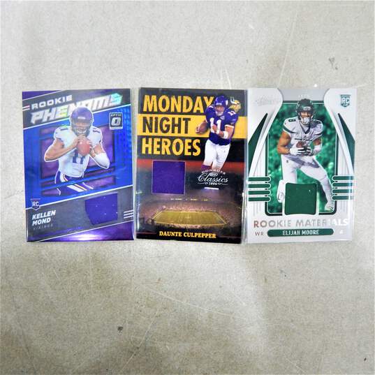 3 NFL Game Used/Game Worn Football Cards image number 1