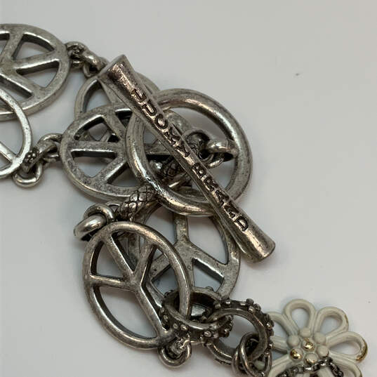 Designer Lucky Brand Silver-Tone Peace Sign Toggle Flower Charm Bracelet image number 4