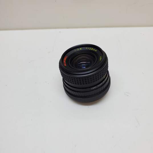 UNTESTED Sliver/Black Canon AE-1 Film Camera Bundle with 3 lenses, Flash & Bag image number 9