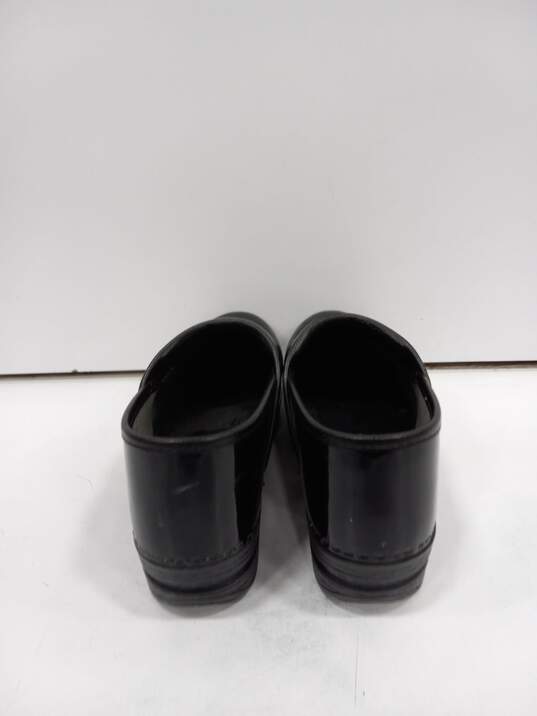 Dansko Black Patent Leather Clogs Women's Size 40/US Size 9 image number 3