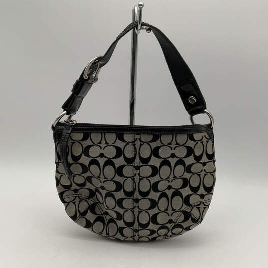 Buy the Womens Gray Black Canvas Signature Print Bag Charm Zipper