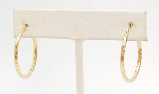 10K Yellow Gold Carved Hoop Earrings 1.2g image number 1